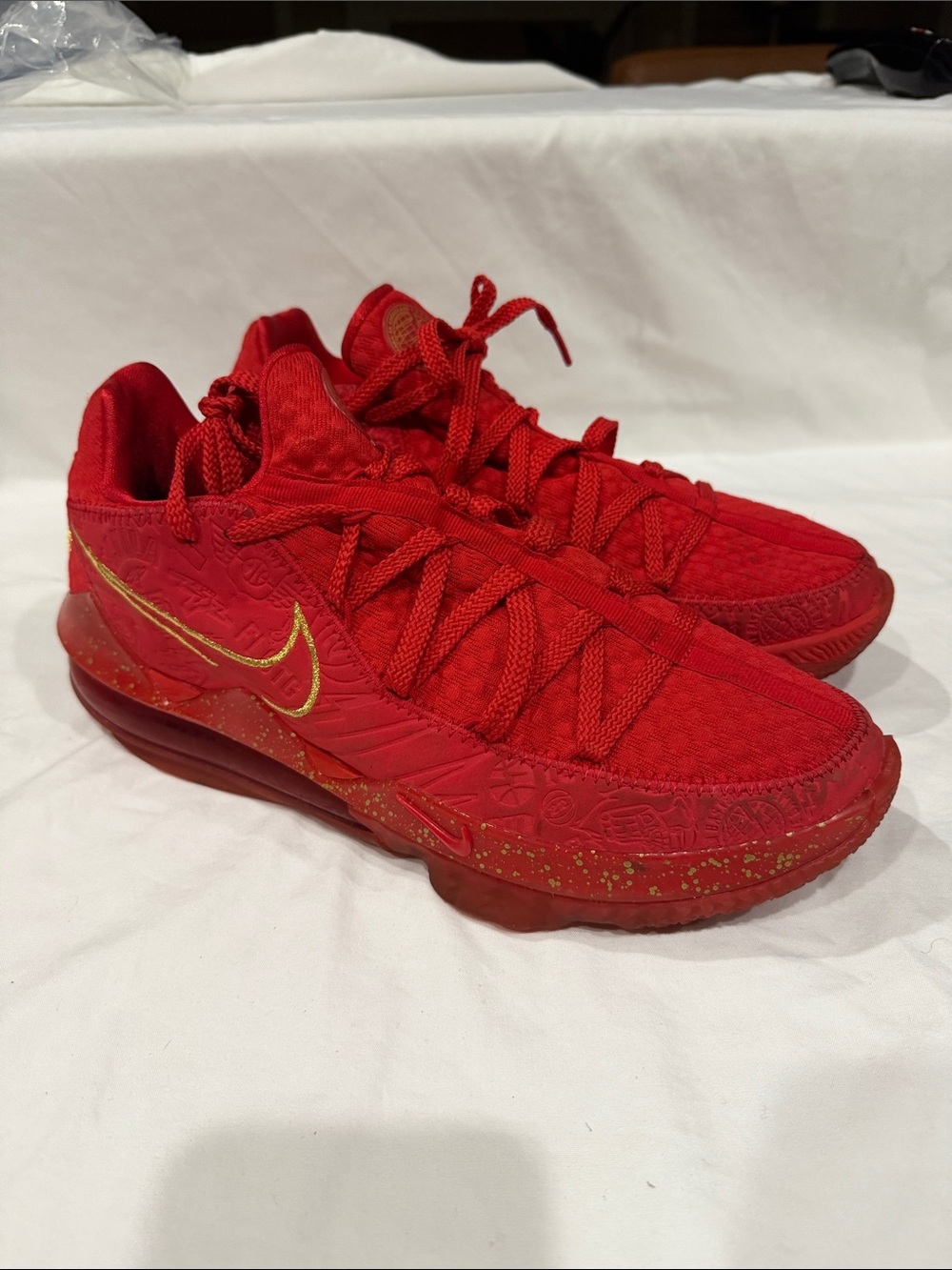Nike Red Athletic Basketball Shoes with Gold Swoosh Accents